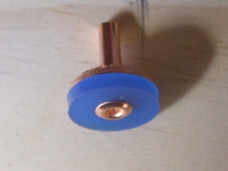 New style washer stem showing attachment rivet