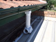 Extra downpipe to garage roof with valve Extra downpipe to garage roof with valve