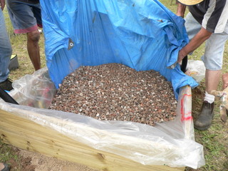 Adding the gravel, gently! Adding the gravel, gently!