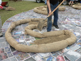 Bed in place and putting in sand to help drainage Bed in place and putting in sand to help drainage