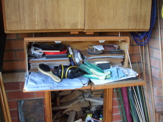 Bottom of vertical cupboard and sandpaper storage cupboard