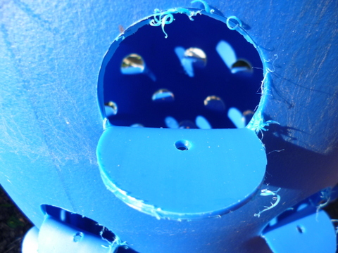 The plastic flap softened and turned out