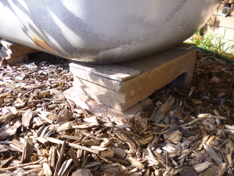 Supporting the first tub