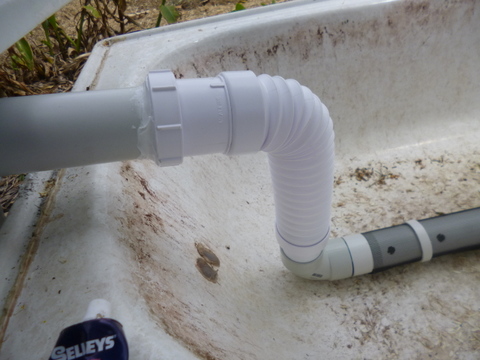 Expandable waste connector in place