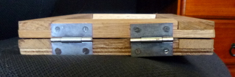 End view, gin closed, showing hinges