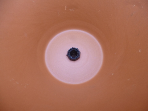 The fitting from inside the pot