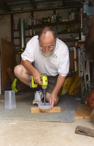 Drilling holes in the reservoir tops