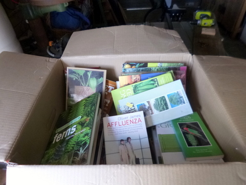 Our box of books, waiting to go into the library