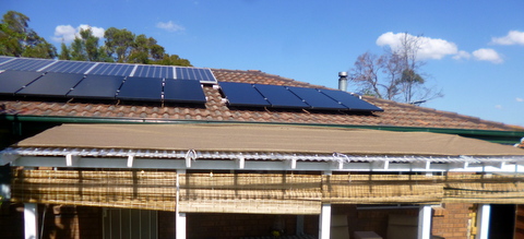 Double 90% shade cloth cover over the deck and solar panels on the roof 