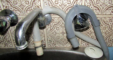 Output from both the washing machine and dishwasher into the sink