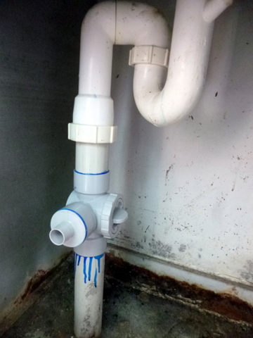 Valve to run laundry effluent to constructed wetland or waste