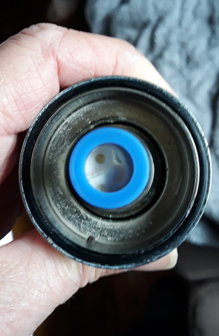 Note the blue plastic ring which forms the seal