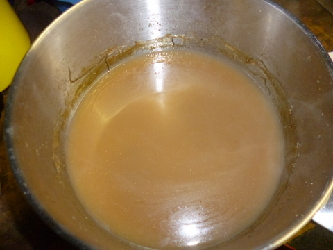 The boiled down glue, with solids removed