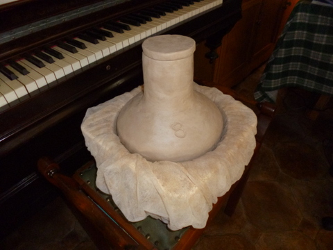 The mould with hair net and dried olla in place