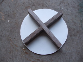 The top of the compression tool, showing wooden stiffener